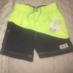 Brand new with tags Carter’s swim trunks. Size 3T